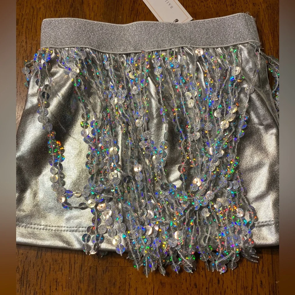 Bailey’s Blossom White ruffled bodysuit top with Sequin Skirt. Size 3–6 months.